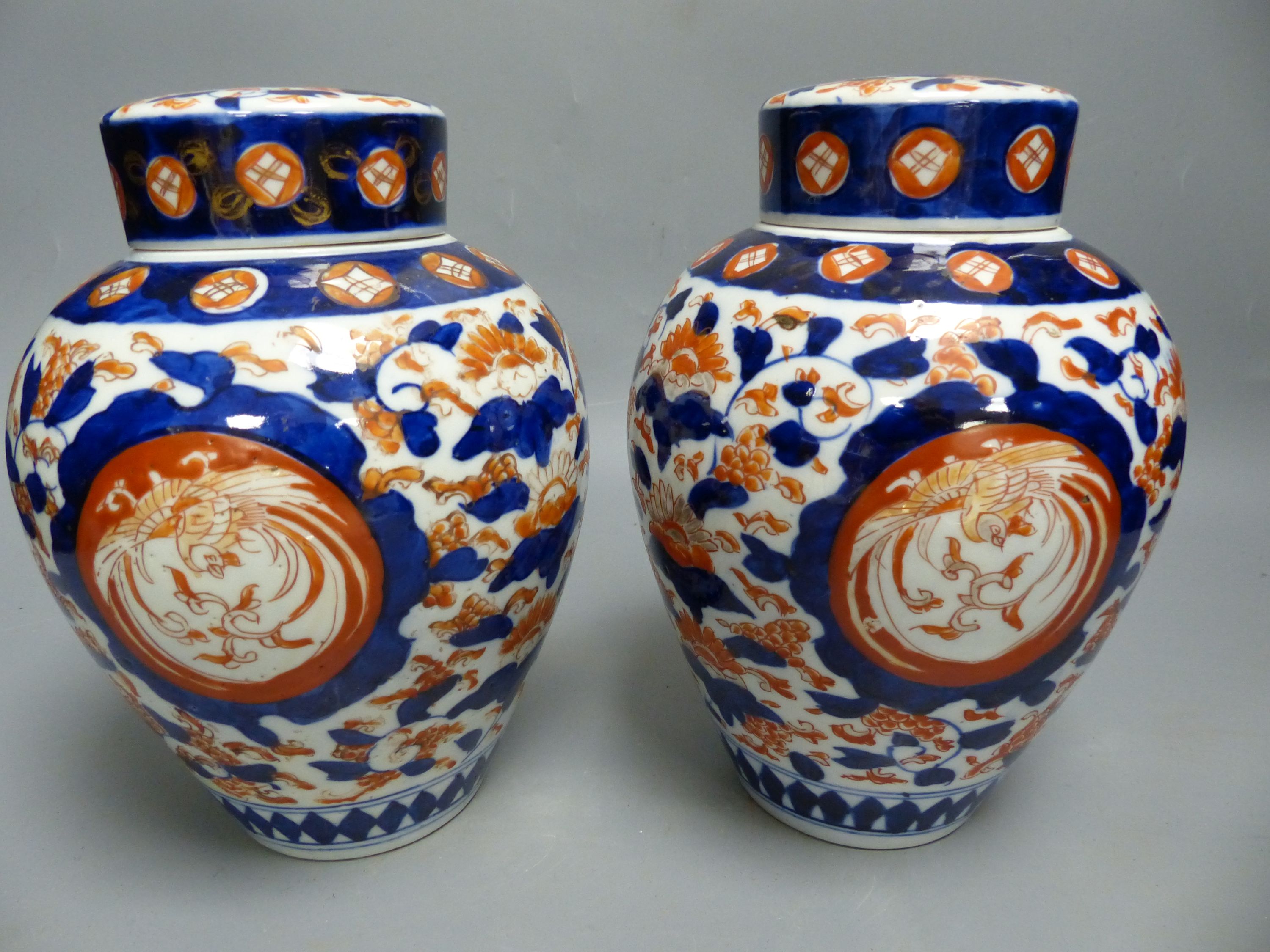 A Japanese Imari vase and cover, by Fukugawa, early 20th century and a similar pair of jars and covers, Meiji period, tallest 36cm